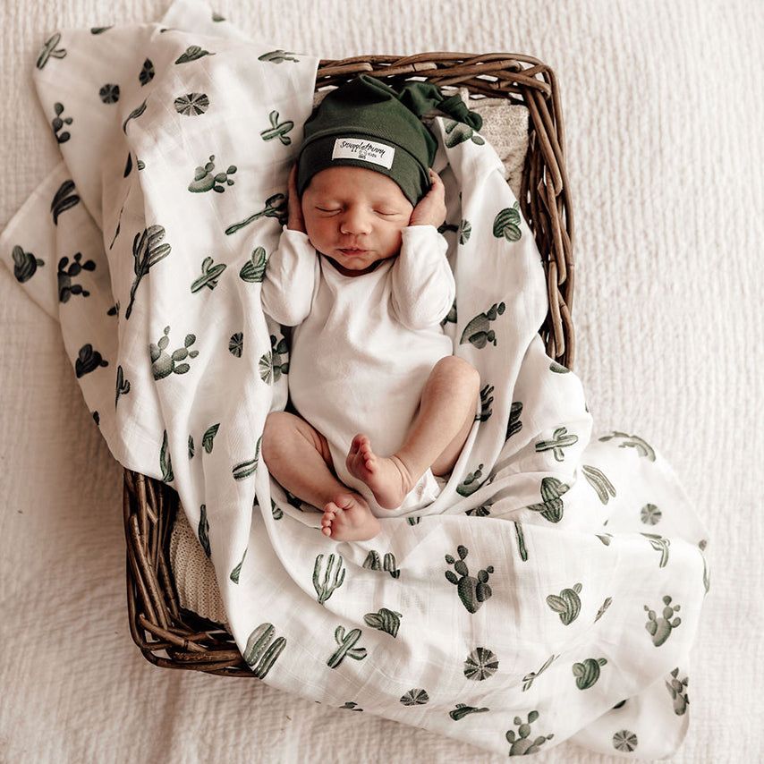 Baby cactus muslin wrap by Snuggle Hunny Kids.