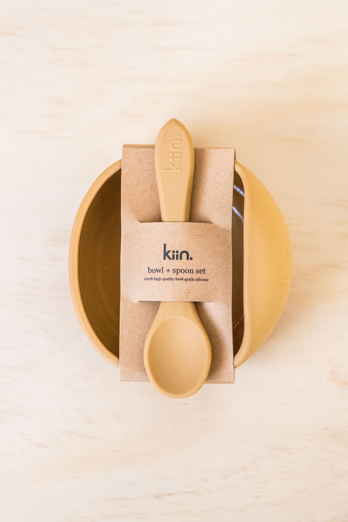 Baby silicone suction bowl and spoon set by Kiin.