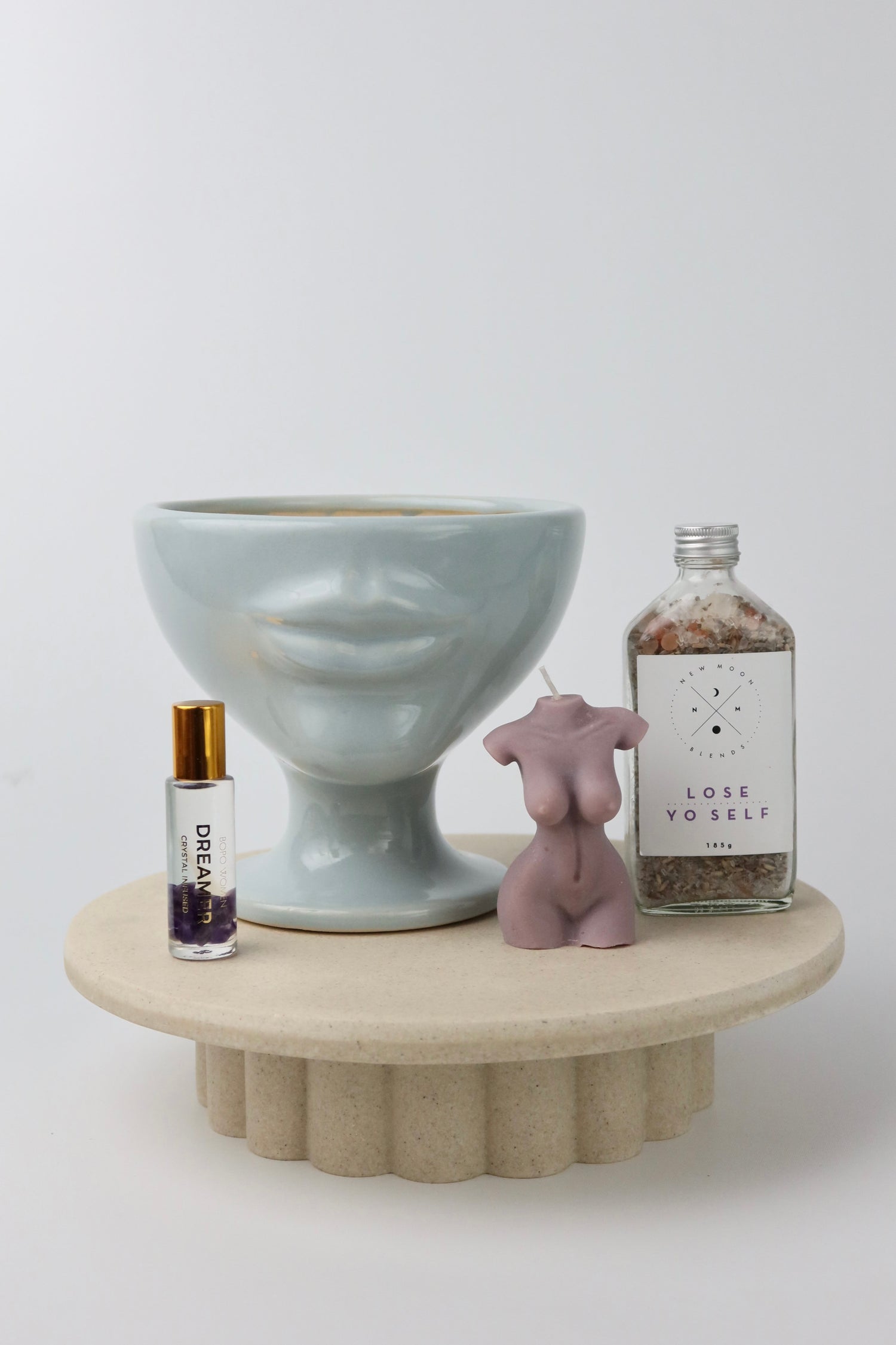 A fun and playful homeware, bath & body gift box. Including pale blue handmade ceramic lip vase, bath soaks, crystal perfume roller & lady soy wax candle. Gift wrapped and presented in our signature wrapping & branding.  