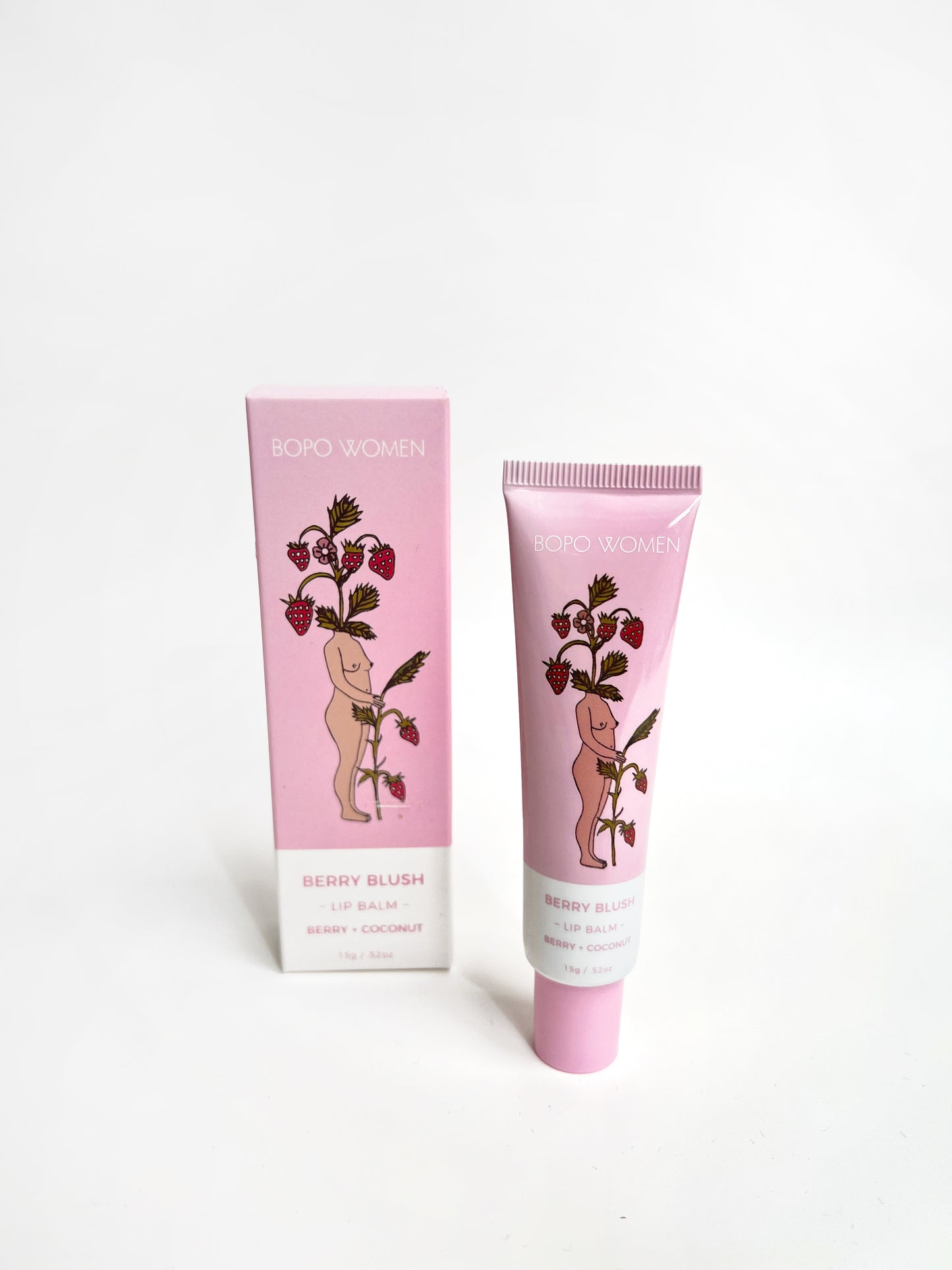 Berry Blush by Bopo Women. A strawberry and coconut flavoured lip balm with a clear glossy finish. In pink and white packaging.